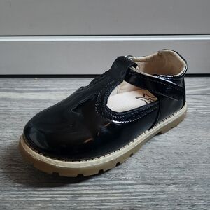 Shiny Black Dress Shoe with Tan Sole